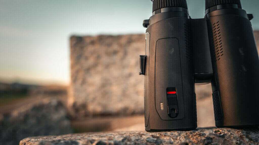 binoculars on a rock