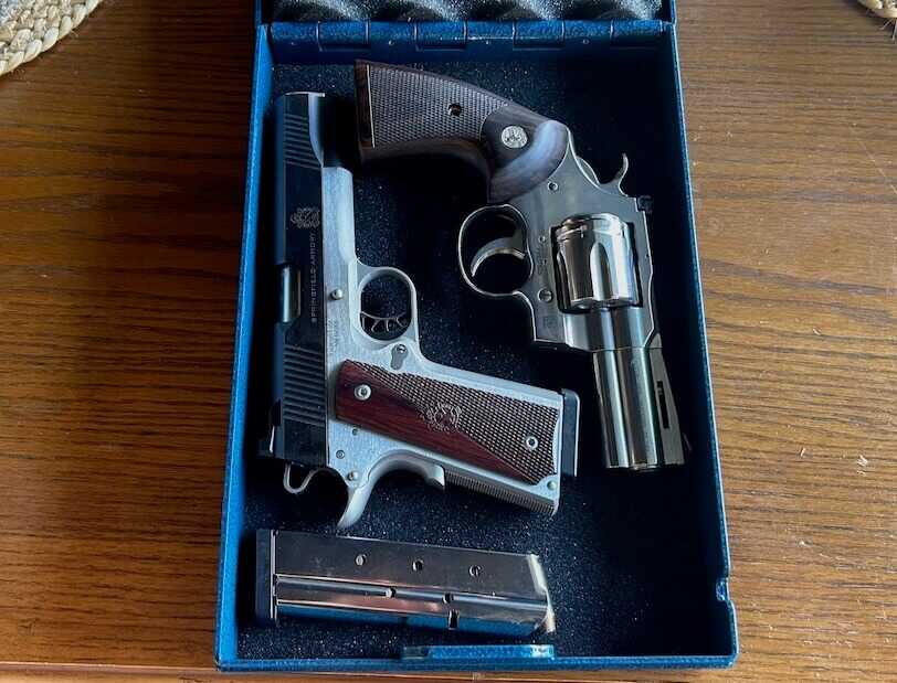 Two handguns—1911 and revolver—securely stored side by side in the Steelhead lock box.