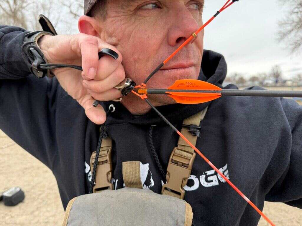 bow pulled to full draw