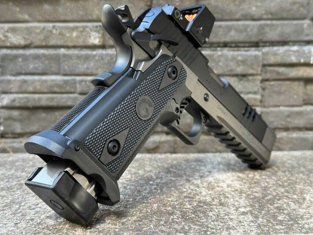 Closeup of the grip of a handgun. 