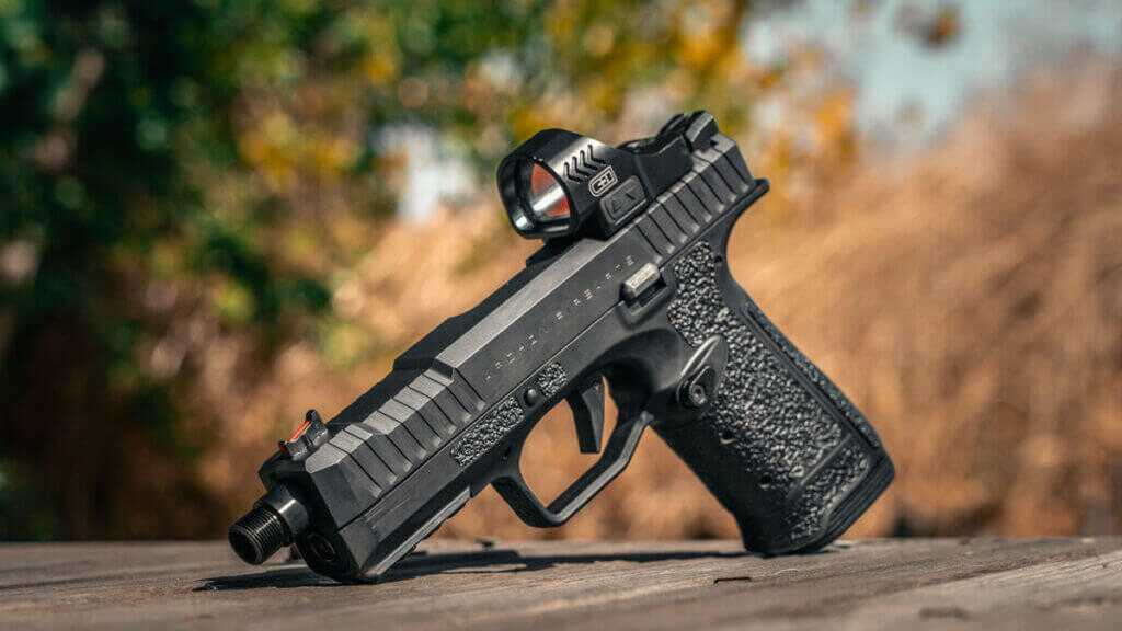 Archon Type B Gen 2 compact 9mm with red dot and threaded barrel showing low bore axis for flat recoil control.