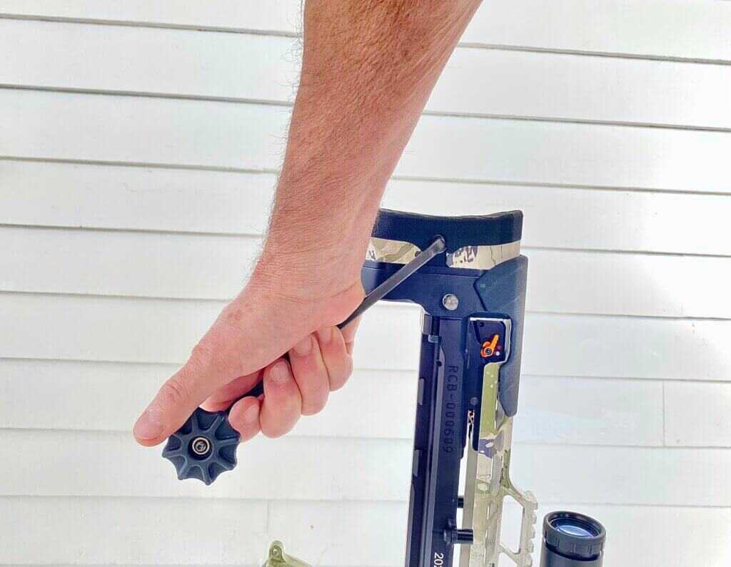 Ravin R470 Versa Draw cocking handle inserted in stock attachment point