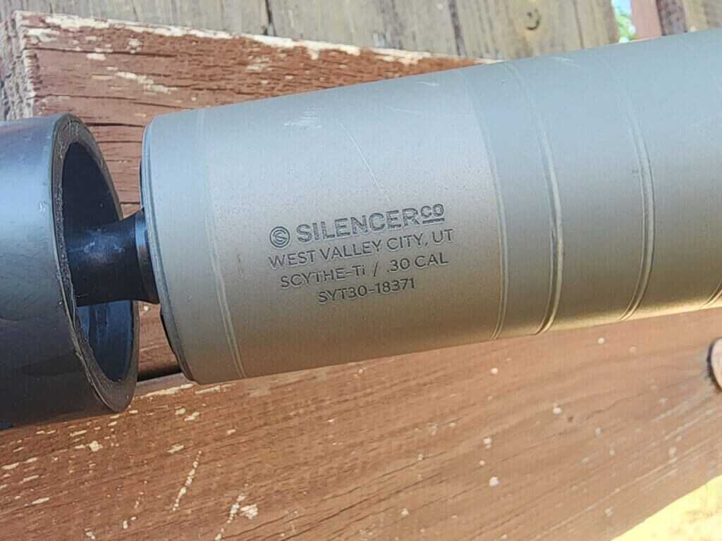 SilencerCo Scythe Ti titanium rifle suppressor on bolt gun, lightweight multi-caliber can for hunting and long range