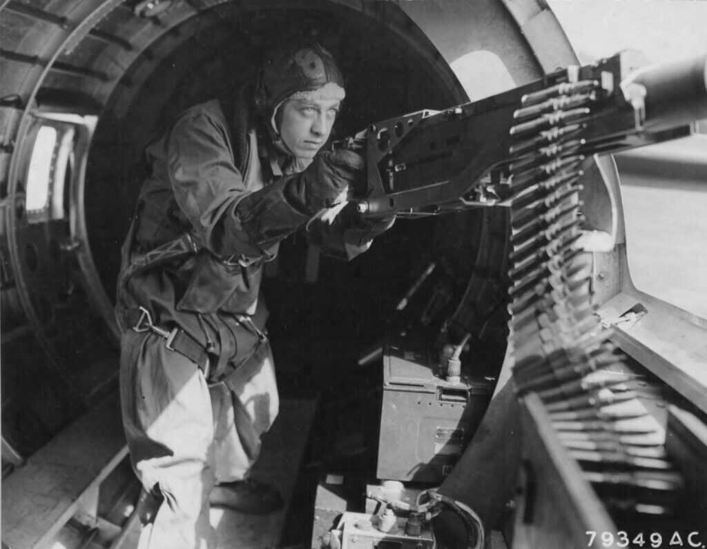 Maynard Snuffy Smith on a B-17 waist gun with .50 caliber; 423d Bombardment Squadron