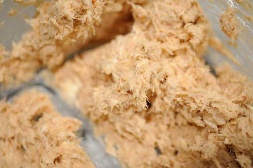 Bowl of smoked trout mixed with cream cheese and Old Bay for a grilled fish sandwich filling.