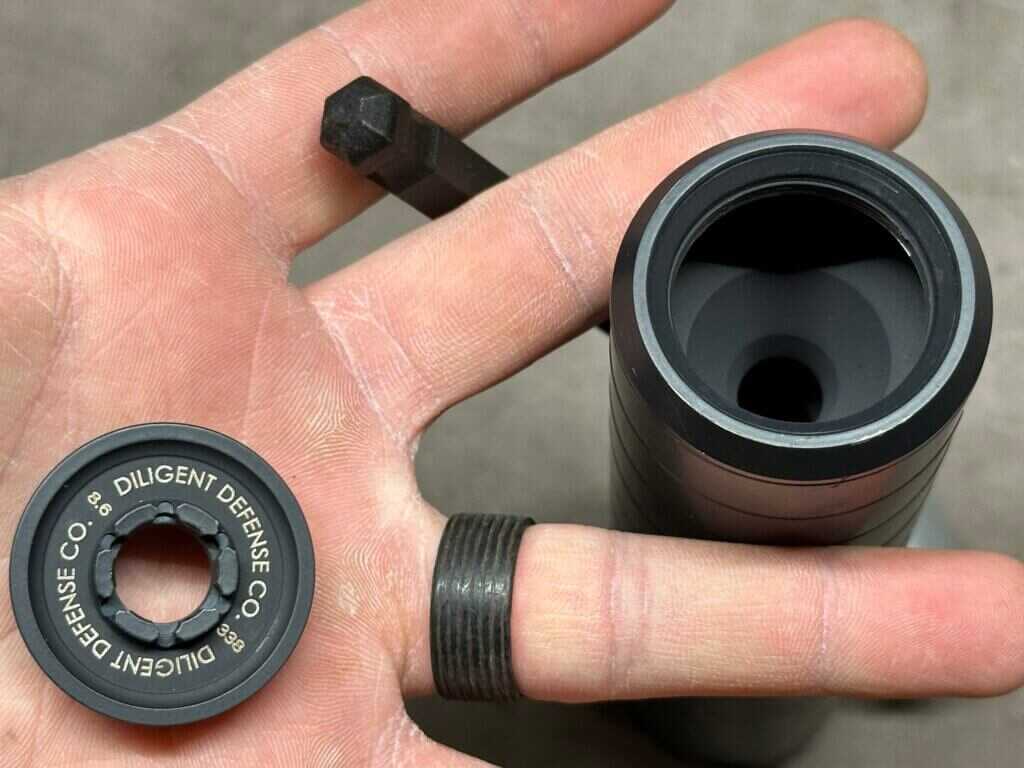 DTF/STI endcap removed showing delta tri-face baffle geometry inside suppressor