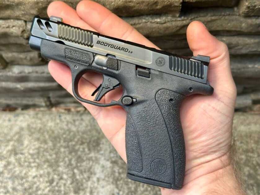 S&W Performance Center Bodyguard 2.0 Carry Comp .380 ACP micro compact with ported barrel shown in hand for scale