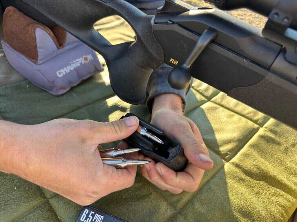 Loading cartridges into Blaser R8 detachable magazine during range session