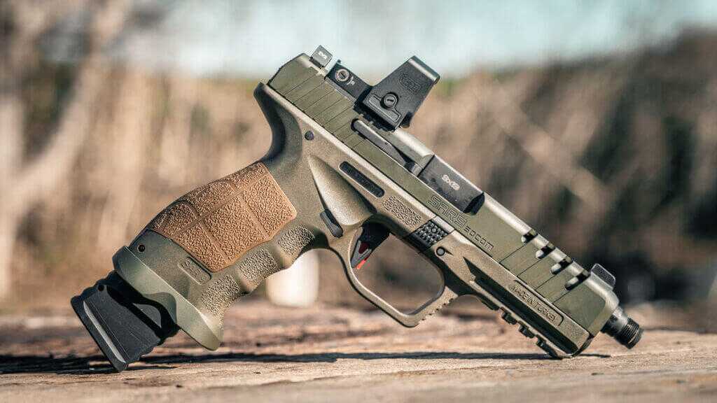 SAR9 SOCOM pistol closeup with suppressor height sights and threaded barrel