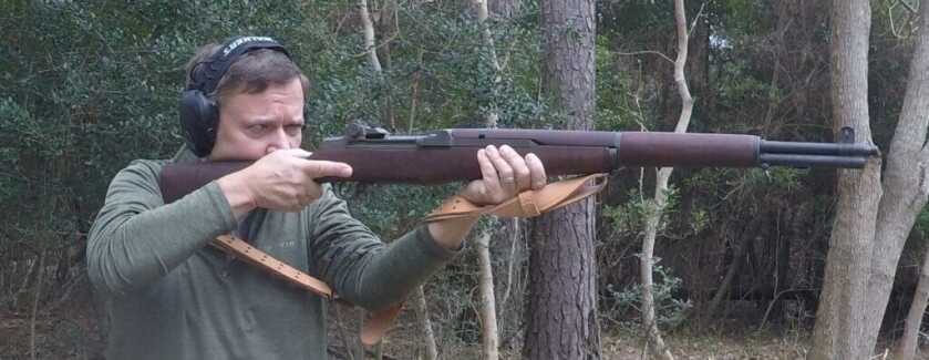 Shooter wrapped into M1 Garand sling firing from supported position