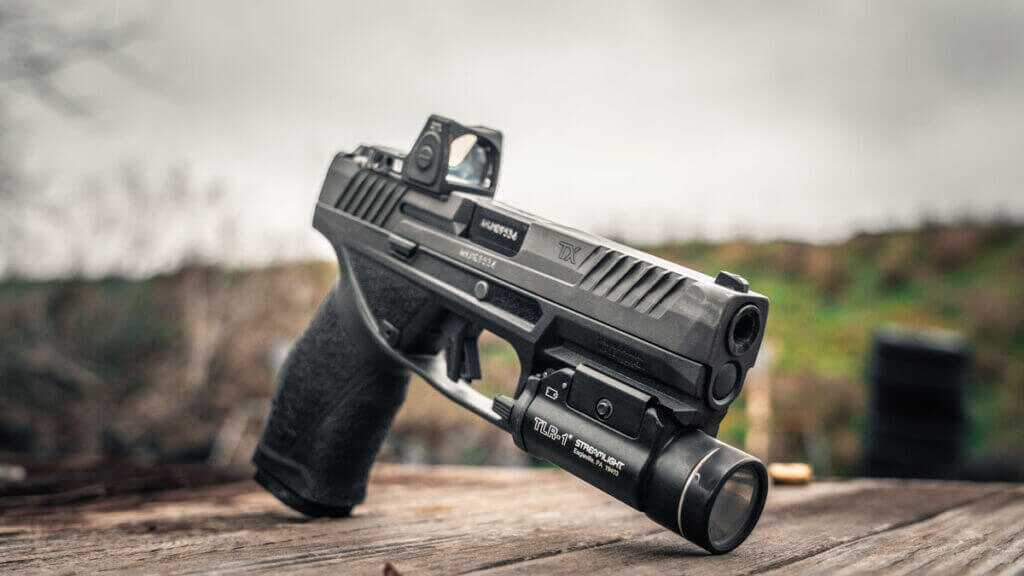 Taurus TX9 full size 9mm pistol on the range, optics ready duty gun