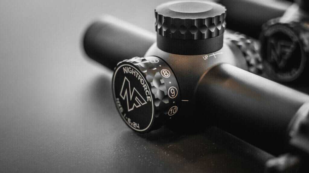 Nightforce NX6 1-6x24mm mounted, showing compact profile and daylight-bright center