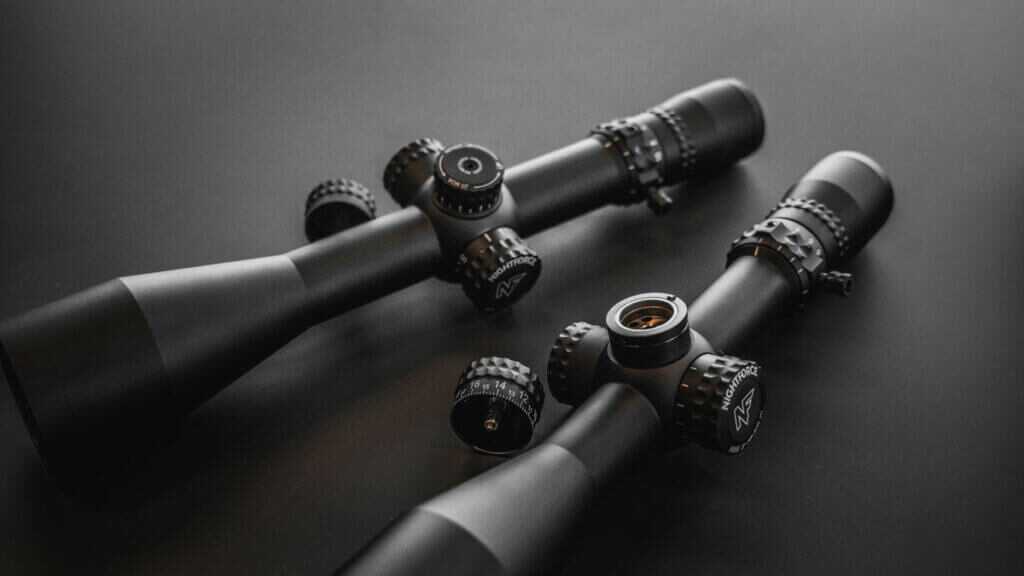 Nightforce NX6 riflescope lineup angled view showing objective bells and elevation turrets