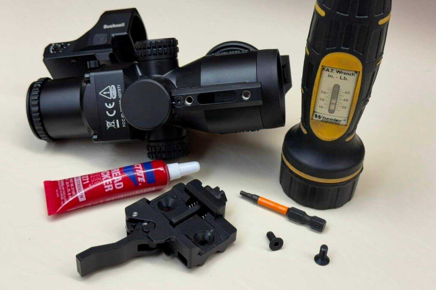 Applying blue Loctite and torquing the IOL25 mount screws to specification