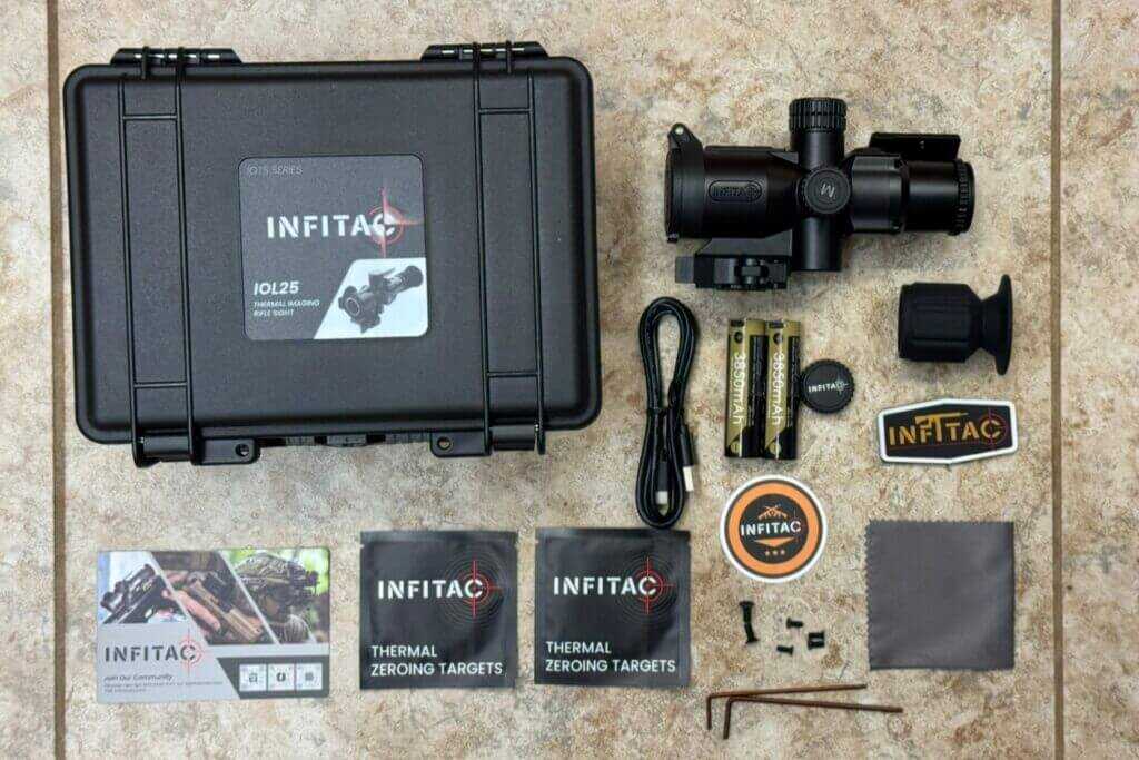 Infitac IOL25 full kit laid out with QD mount, offset red dot mount, batteries, tools, and accessories