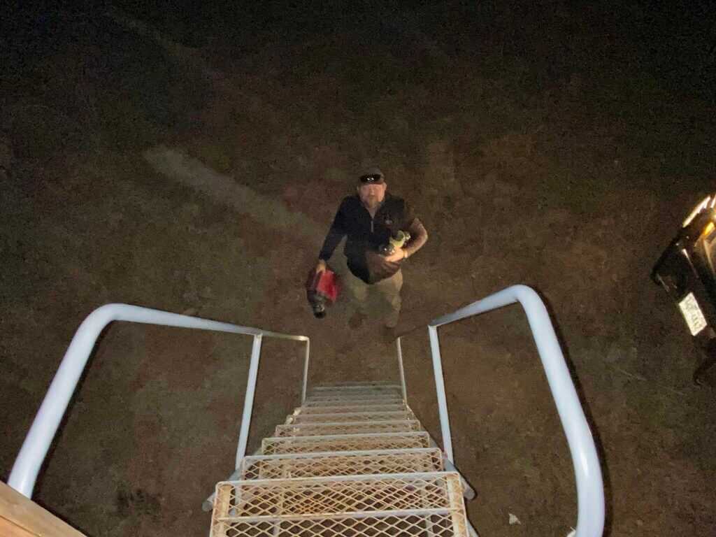 Dinner and propane heater delivered to hunting stand during West Texas night hunt with thermal optics