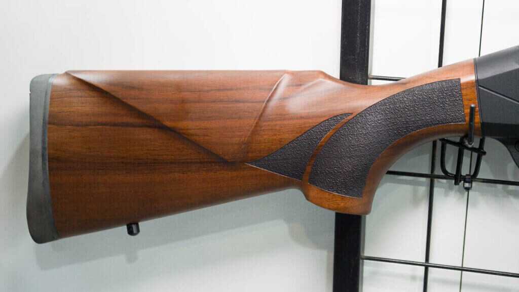 Adler AD500 walnut stock with modern comb and laser cut checkering close up