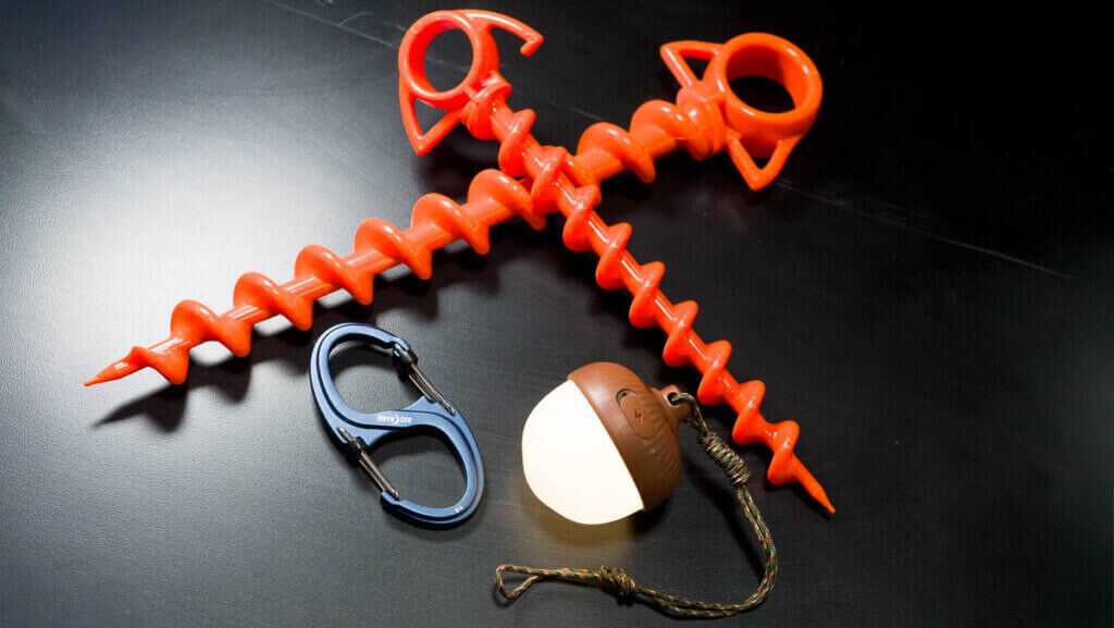 Close up of all the products lying on a black table top.