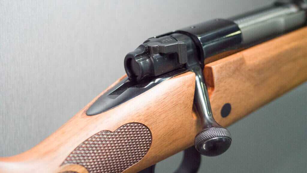 close up view of the back of the bolt showing the safety.