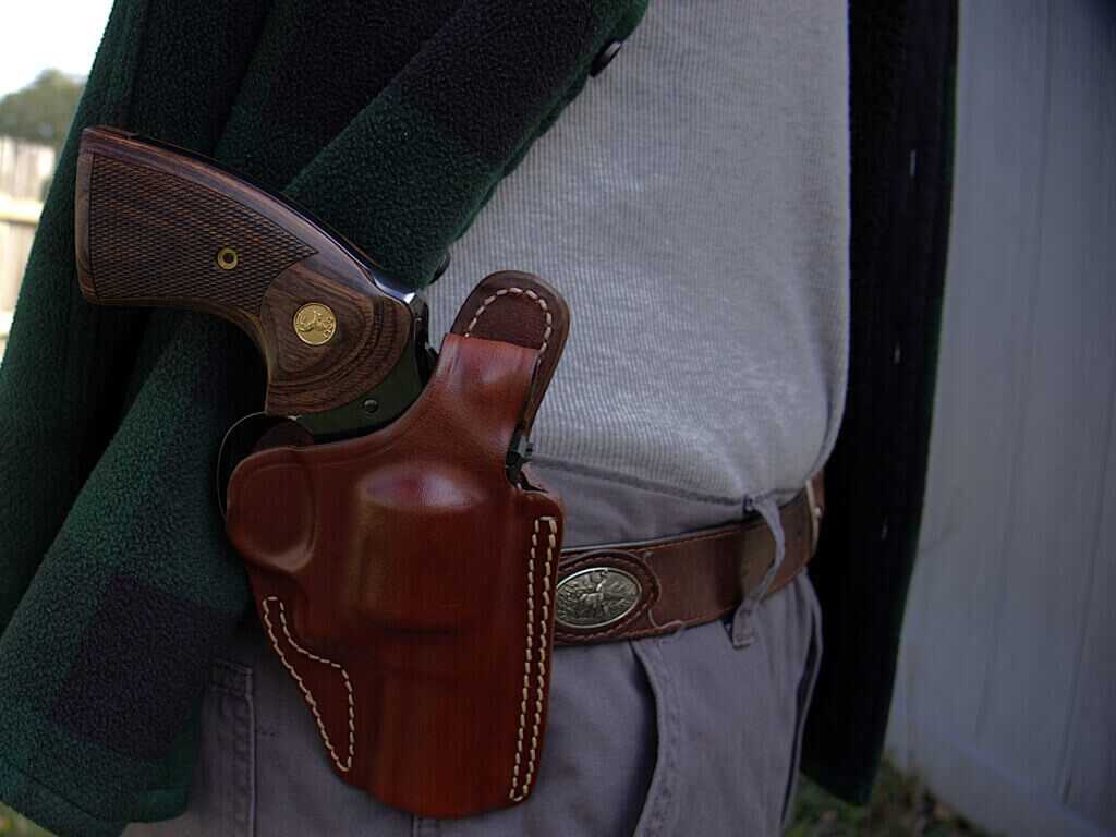 blued Colt Python 3-inch revolver in a Craft Belt Side leather holster