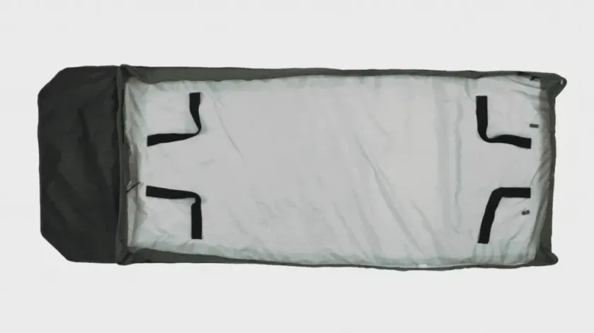 animation of the bedroll being made like a bed with sheets and blankets.