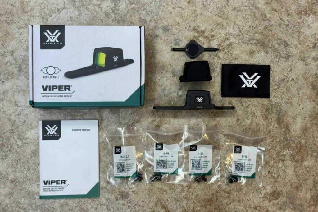 Vortex Viper Shotgun Enclosed Micro Green Dot package contents with tool manual screws battery and lens cloth