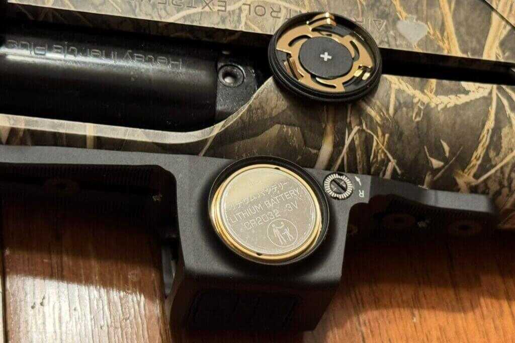 Side-loading CR2032 battery compartment on Vortex Viper Shotgun Enclosed Micro Green Dot housing