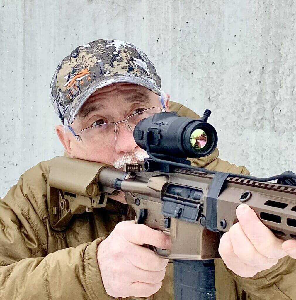 Sightmark Shade thermal scope on rifle setup suited for common coyote and hog night hunts