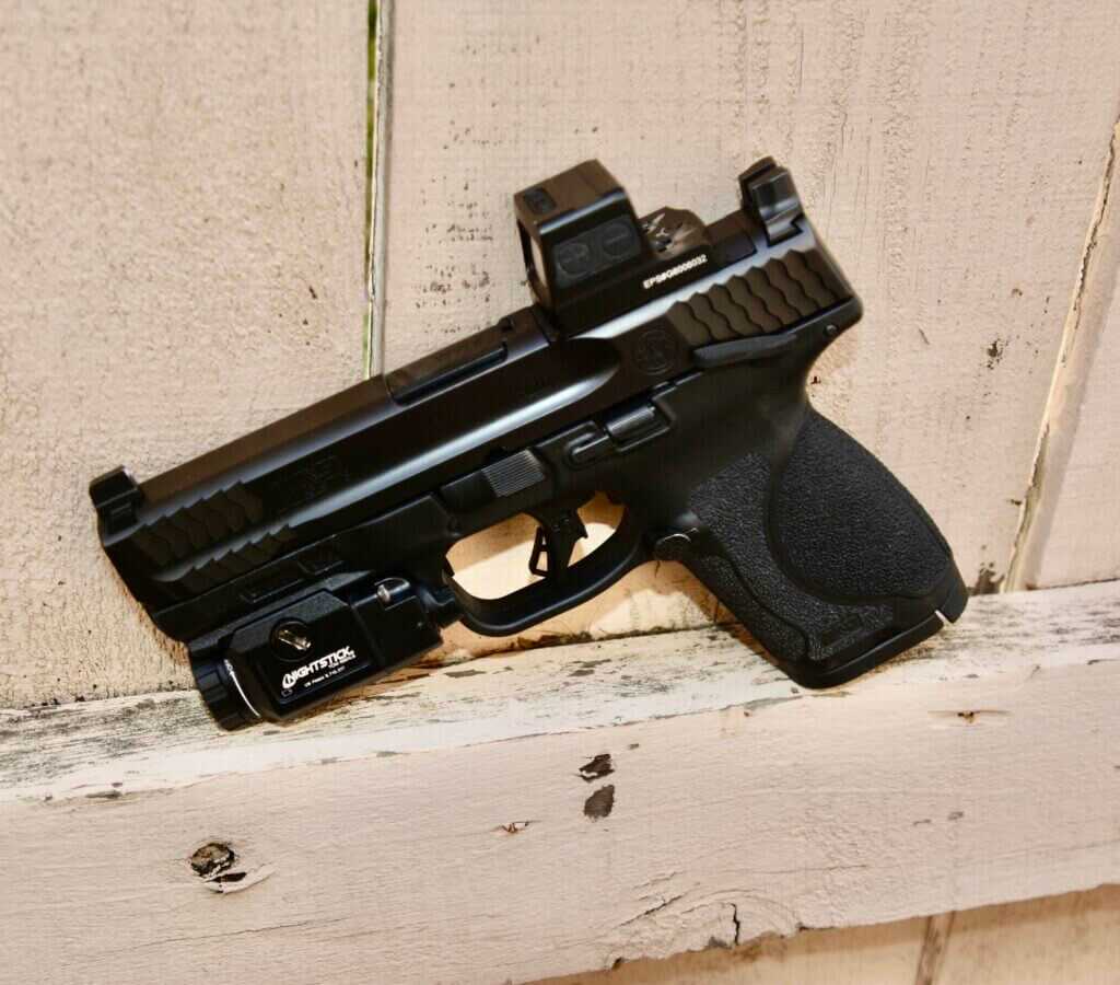 Smith & Wesson M&P 2.0 Compact with Holosun EPS green dot and Nightstick weapon light configured for carry
