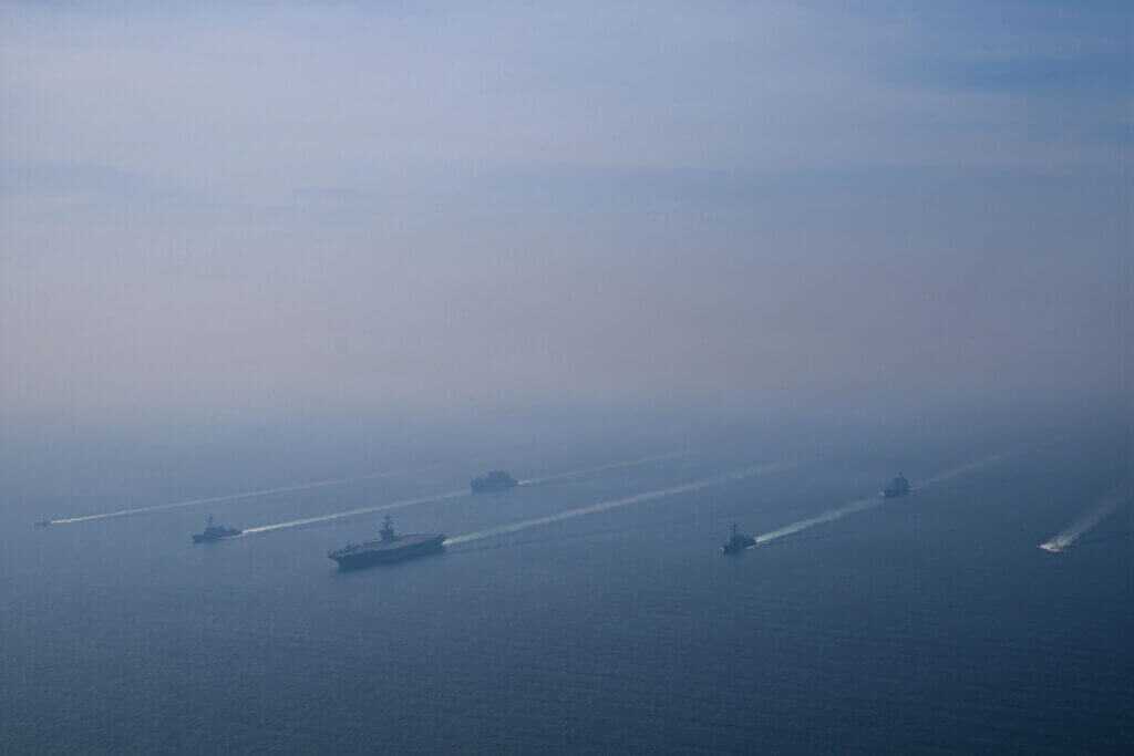 Abraham Lincoln Carrier Strike Group underway at sea showing overwhelming naval power projection