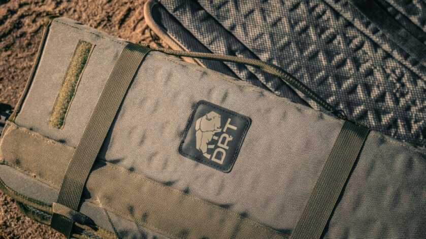 DRT Recon Lounger packed down for backcountry carry showing compact size and five-in-one hunting gear utility