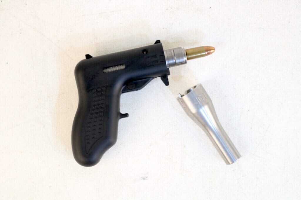 Action of the Altor 9mm single-shot pistol with barrel removed to show its simple operating system