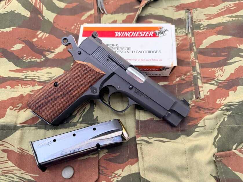 Springfield Armory SA-35 4-inch pistol with defensive 9mm ammunition, showing the compact Hi Power profile and carry-friendly proportions