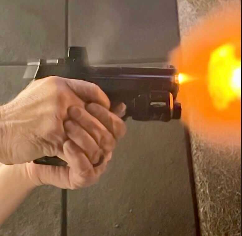 Shooter running the Smith & Wesson M&P 2.0 at the range during live-fire testing