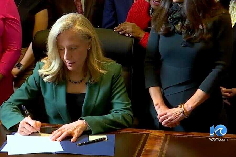 Virginia Gov. signing legislation.