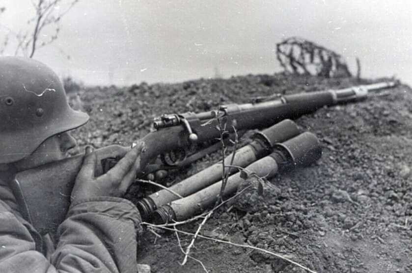 WWII German soldier carrying Mauser Karabiner 98k service rifle