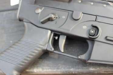 The trigger on the 556 line is wide. If you need more room, the trigger guard can be swapped for a larger one. 