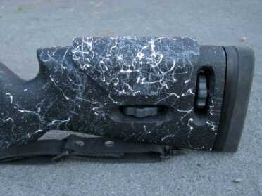 This shows the MMR stock's adjustable cheek piece and length of pull thumbwheels.