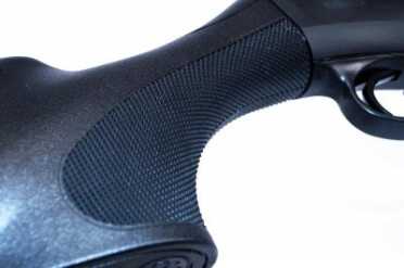 The entire grip area is well checkered.