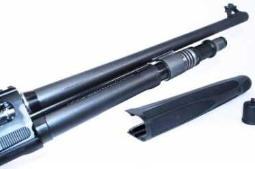 In standard configuration, you'll be able to fit four 2 ¾ inch shells in the tube, but you'll have to remove the plug first.