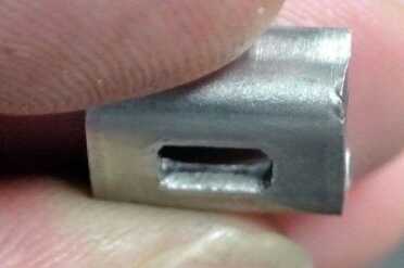 The mainspring seat.  Notice the sharp edge inside.