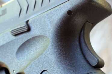 The grip safety is easily engaged, despite being small.