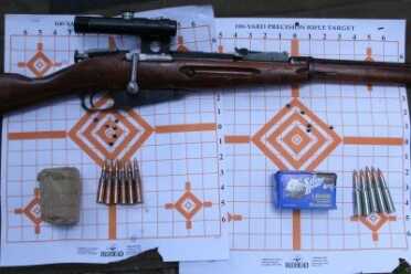 The one with the black scope has the Timney trigger in it and performed about the same. Without the trigger it would have been less, and it is almost definitely a fake piece together. 