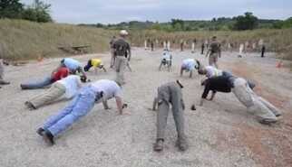 The class is allegedly being punished for making a mistake or missing their targets.  (Photo credit: Kansas City Star)