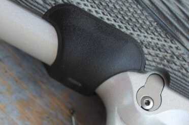 The pad requires a good grip before it shines. Typical holstering of the gun won't turn it on.