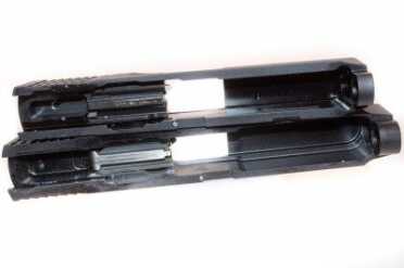 M&P 22 Compact slide (top) and original model (bottom)