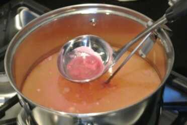 As the salts heat up the pink die that is in them floats to the surface.  You need to skim it off to better see the parts as they blue.   This is only the case with fresh salts.