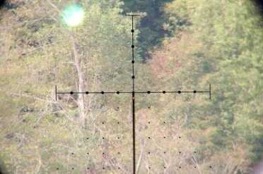 The unit indicator (Y or M) and distance turn off after 10 seconds but the wind offset and the aiming dot (just below the crosshairs) remain illuminated for another 80 seconds then turn off. That’s considered one cycle. The battery is good for about 5,000 cycles.