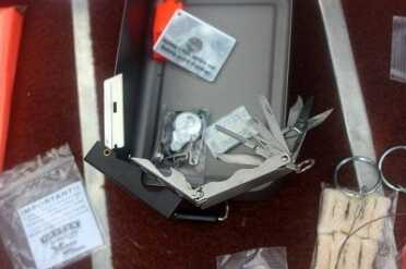 The kit contains a couple of knives and some other tools, too.