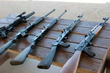 A/B testing AKs with the Raptor triggers. We were shooting R&D guns--the Saiga 12 didn't even have a trigger guard. 